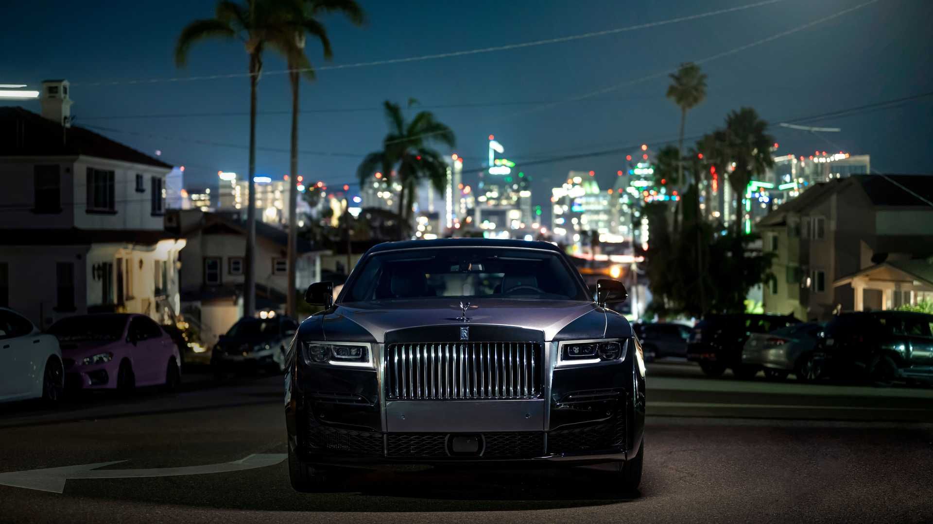 rolls royce phantom  all black  with black tint at night with a full  moon  Wallpapersai