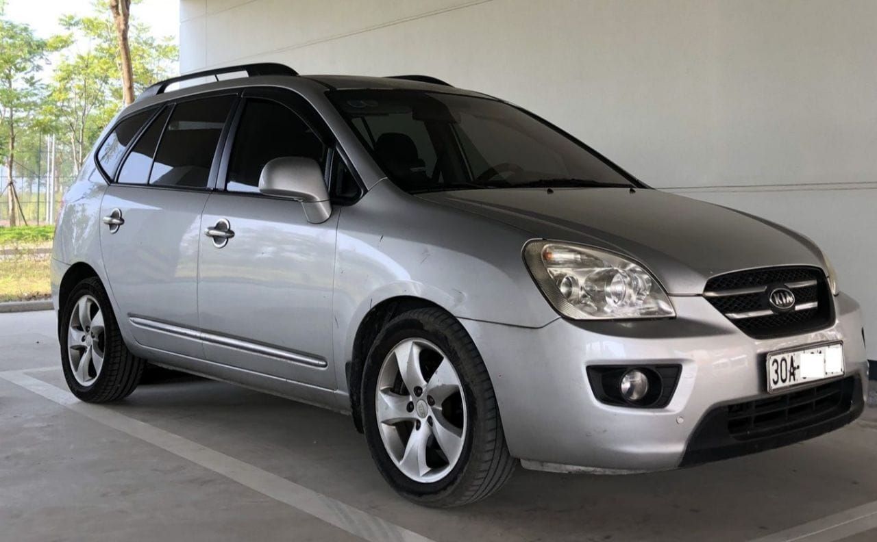 Bán xe Kia Carens 2009 gia đình 7 chỗ cũ 113000km màu xám