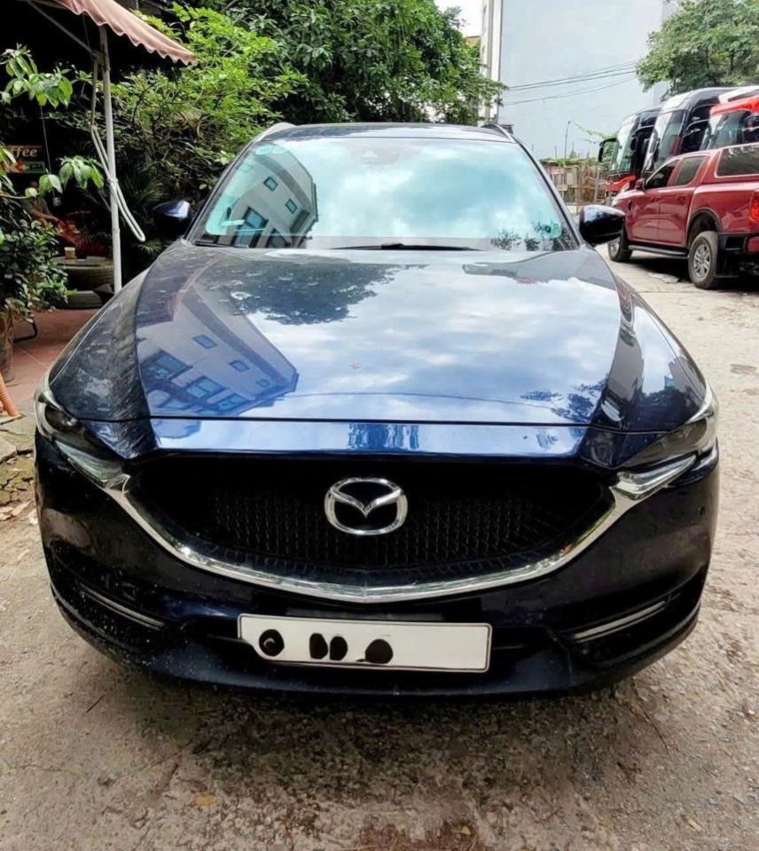 Nhà mình cần bán lại chiếc Mazda CX-5 Premium 2.0
