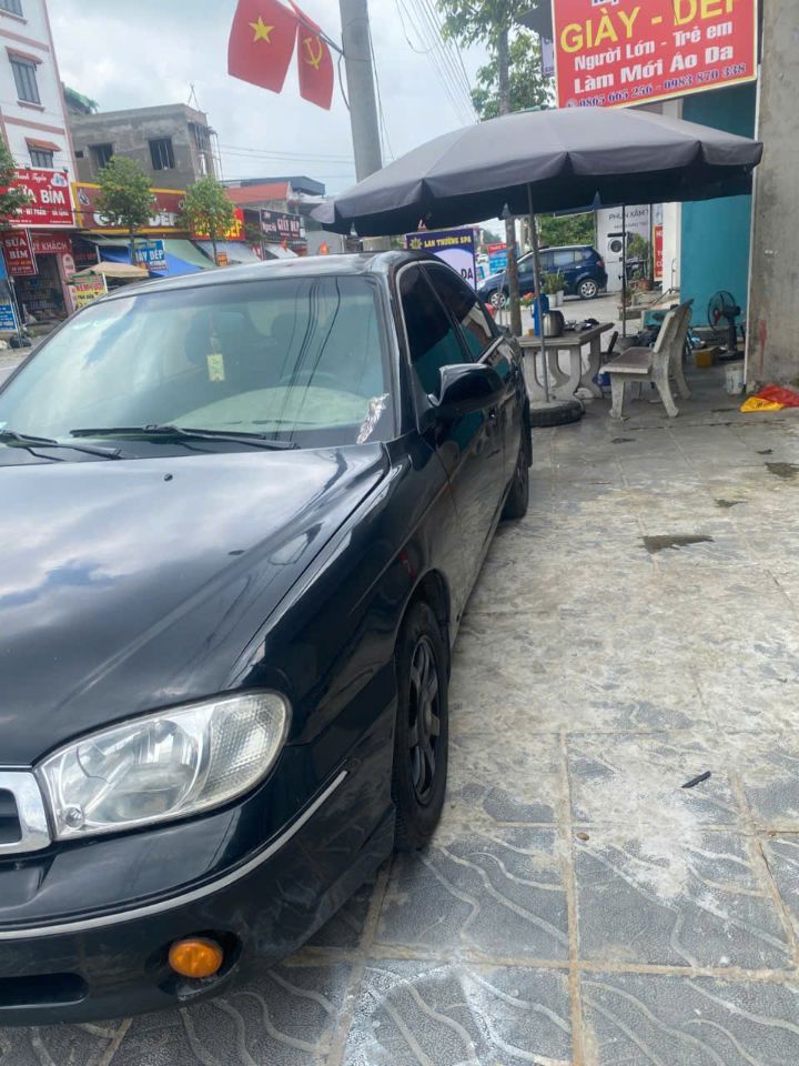 Cần bán xe Kia Spectra 2003 - Giá chỉ 45 triệu